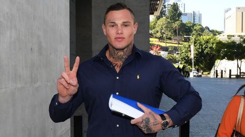 Rugby League player Dan Kilian, gestures as he leaves the Supreme Court in Brisbane. (AAP)