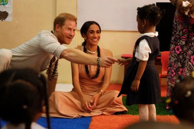ABUJA, NIGERIA - MAY 10:  (EDITORIAL USE ONLY) Prince Harry, Duke of Sussex and Meghan, Duchess of Sussex visit Lightway Academy on May 10, 2024 in Abuja, Nigeria. (Photo by Andrew Esiebo/Getty Images for The Archewell Foundation)