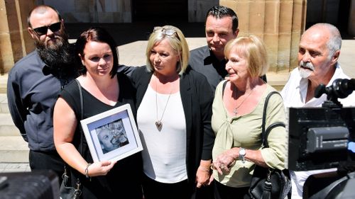 Mr Atkins' family outside the inquest today. (AAP)
