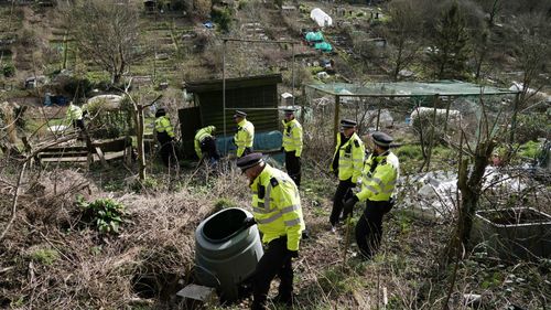 Police officers work in an urgent search operation to find the missing baby of Constance Marten, who has not had any medical attention since birth in early January, in Roedale Valley Allotments, in Brighton, Tuesday Feb. 28, 2023. 