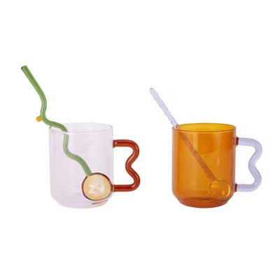 Two glass mugs with stirrers: $20