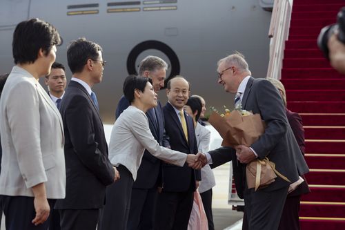 Prime Minister Anthony Albanese and his fiance Jodie Haydon arrive in Shaghai, China on July 12, 2025. Photo: Dominic Lorrimer