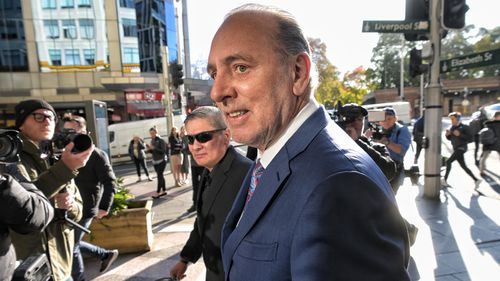 Brian Houston enters Downing Centre courts Photo Nick Moir 15 June 2023