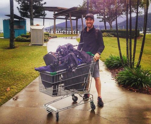Camera operators need a lot of gear. In this photo, an abandoned trolley made an unlikely but convenient transport option in Airlie Beach. (Image: 9NEWS)
