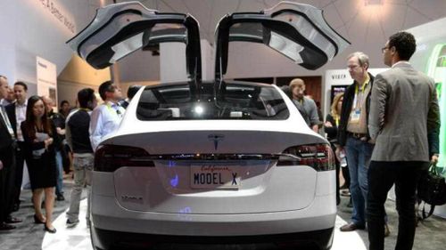 Tesla's new electric model threatened by falling oil prices
