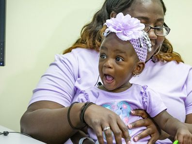 Adorable moment a deaf toddler hears for the first time after receiving cochlear implants. 