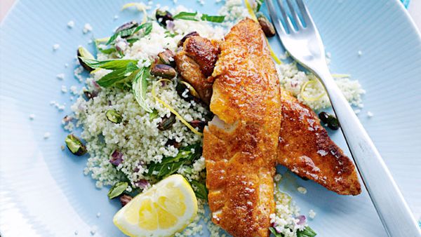 Spiced fried fish with lemon pistachio couscous