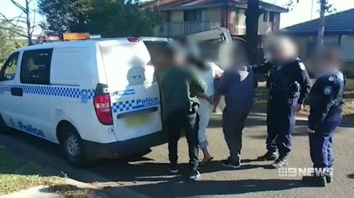 The man being arrested in Ingleburn. 