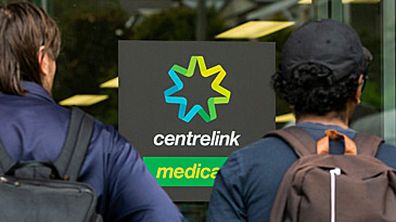 Young people outside Centrelink office (Getty)