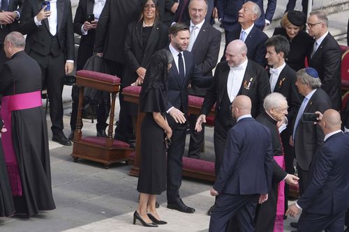 US Vice President JD Vance,  and his wife Usha Vance are greeted as they arrive.