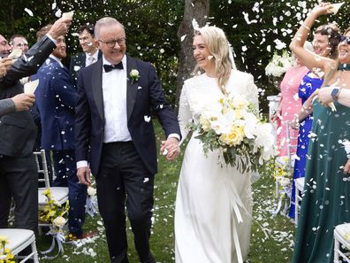 The Prime Minister Anthony Albanese and Jodie Haydon walk down the aisle after getting married.