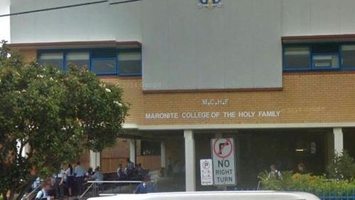Second teenager arrested after screaming death threats outside Sydney school