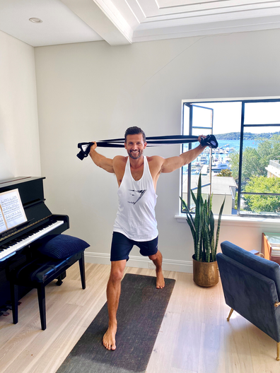 Tim Robards home workout with a towel