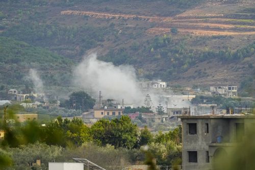 Smoke rises after a shelling in Um el-Tot, a Lebanese border village with Israel, south Lebanon, Thursday, Oct. 19, 2023. 