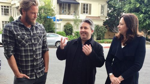 Australian actor Travis Fimmel, screenwriter Stuart Beattie and Queensland Premier Annastacia Palaszczuk are seen in West Hollywood. (AAP)