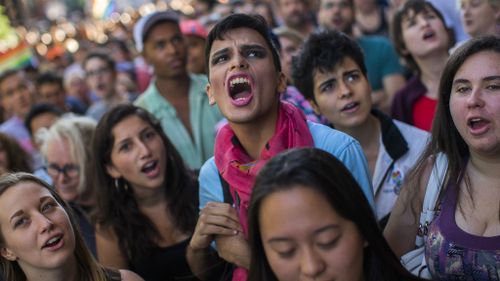 LGTBQ supporters outside a makeshift memorial in New York, rallying for LGBTQ rights. (AP/Andres Kudacki)