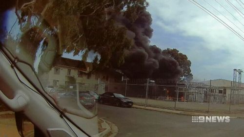 Plumes of black smoke billowed from the substation. (9NEWS)