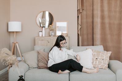 Woman reading on a couch