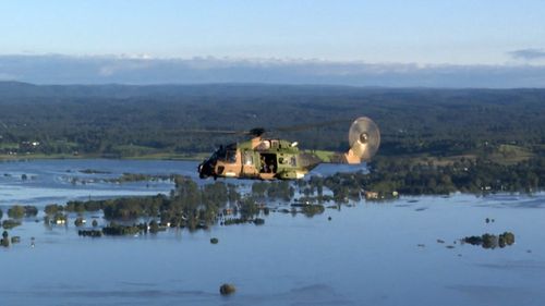 A Royal Navy Taipan helicopter crew extracted the campers. NSW Floods