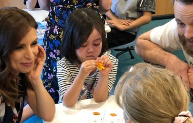 Blake interacted with special needs kids using LEGO to learn.