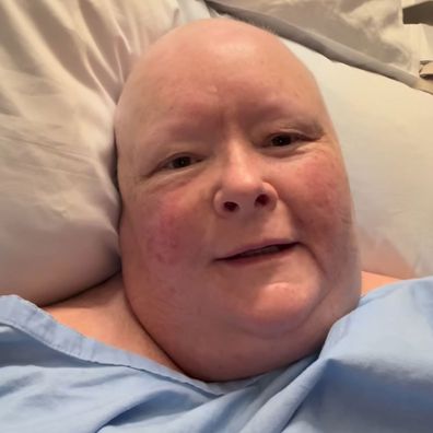 Magda Szubanski films a video message from her hospital bed.