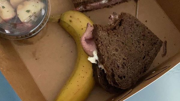 FC players lunches, featuring a roast beef sandwich, banana and potato salad