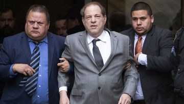 Harvey Weinstein, center, leaves court following a bail hearing, Friday, Dec. 6, 2019 in New York
