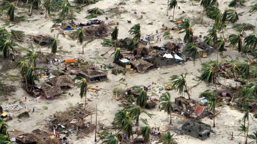 Badly damaged communities are seen from an aerial view in Macomia district of Mozambique.