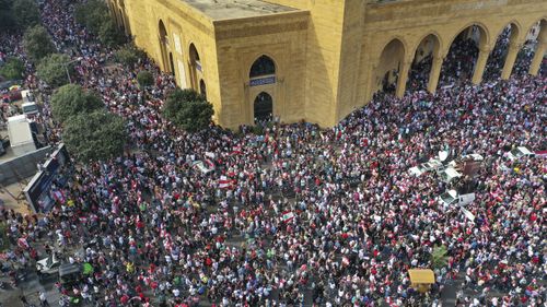 An aerial view shows tens of thousands of anti-government protesters, in downtown Beirut, Lebanon, Sunday, Oct. 20, 2019. 