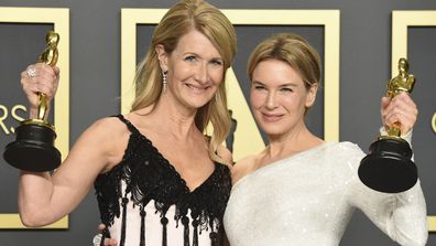Laura Dern, winner of the award for best performance by an actress in a supporting role for "Marriage Story", left, and Renee Zellweger, winner of the award for best performance by an actress in a leading role for "Judy", pose in the press room at the Oscars on Sunday, Feb. 9, 2020, at the Dolby Theatre in Los Angeles
