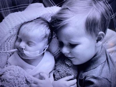 Baby Katie with her big brother Charlie.