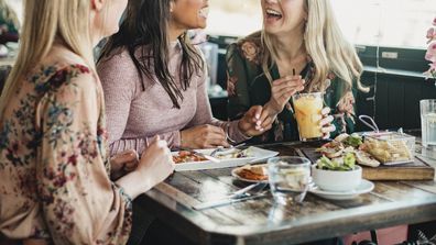 Three friends having lunch