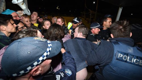 Protesters chanted anti-racism slogans outside Pauline Hanson's Senate launch. (AAP)