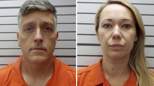 FILE - This combination of booking photos provided by the Muskogee County, Okla., Sheriff's Office shows Jon Hallford, left, and Carie Hallford, owners of Return to Nature Funeral Home. (Muskogee County Sheriff's Office via AP, File)