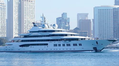 The super yacht Amadea passes San Diego as it comes into the San Diego Bay Monday, June 27, 2022, seen from Coronado, Calif. The $325 million superyacht seized by the United States from a sanctioned Russian oligarch arrived in San Diego Bay on Monday. (AP Photo/Gregory Bull)Alt