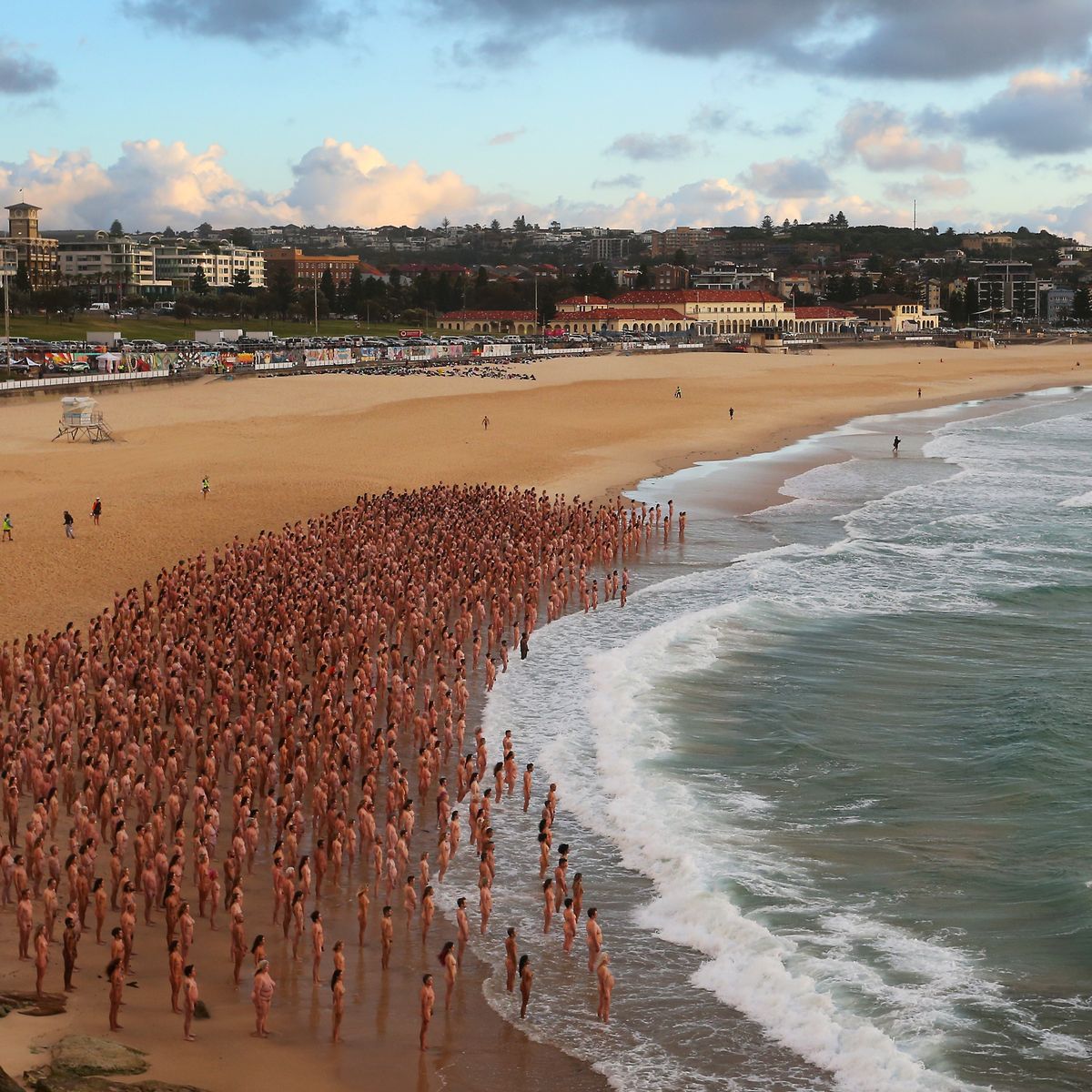 Thousands strip off at Bondi Beach for renowned photographer