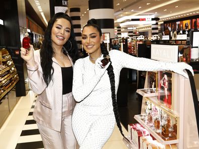 Mona Kattan and Huda Kattan are pictured while they visit a Sephora store.