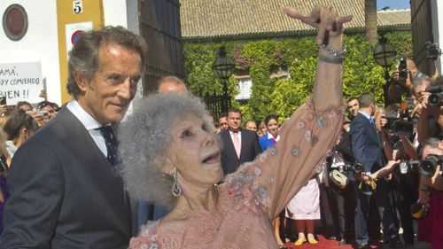 Maria del Rosario Cayetana Alfonsa Victoria Eugenia Francisca Fitz-James Stuart y de Silva, Spanish Duchess of Alba, dances flamenco on her wedding day in 2011. (AAP)