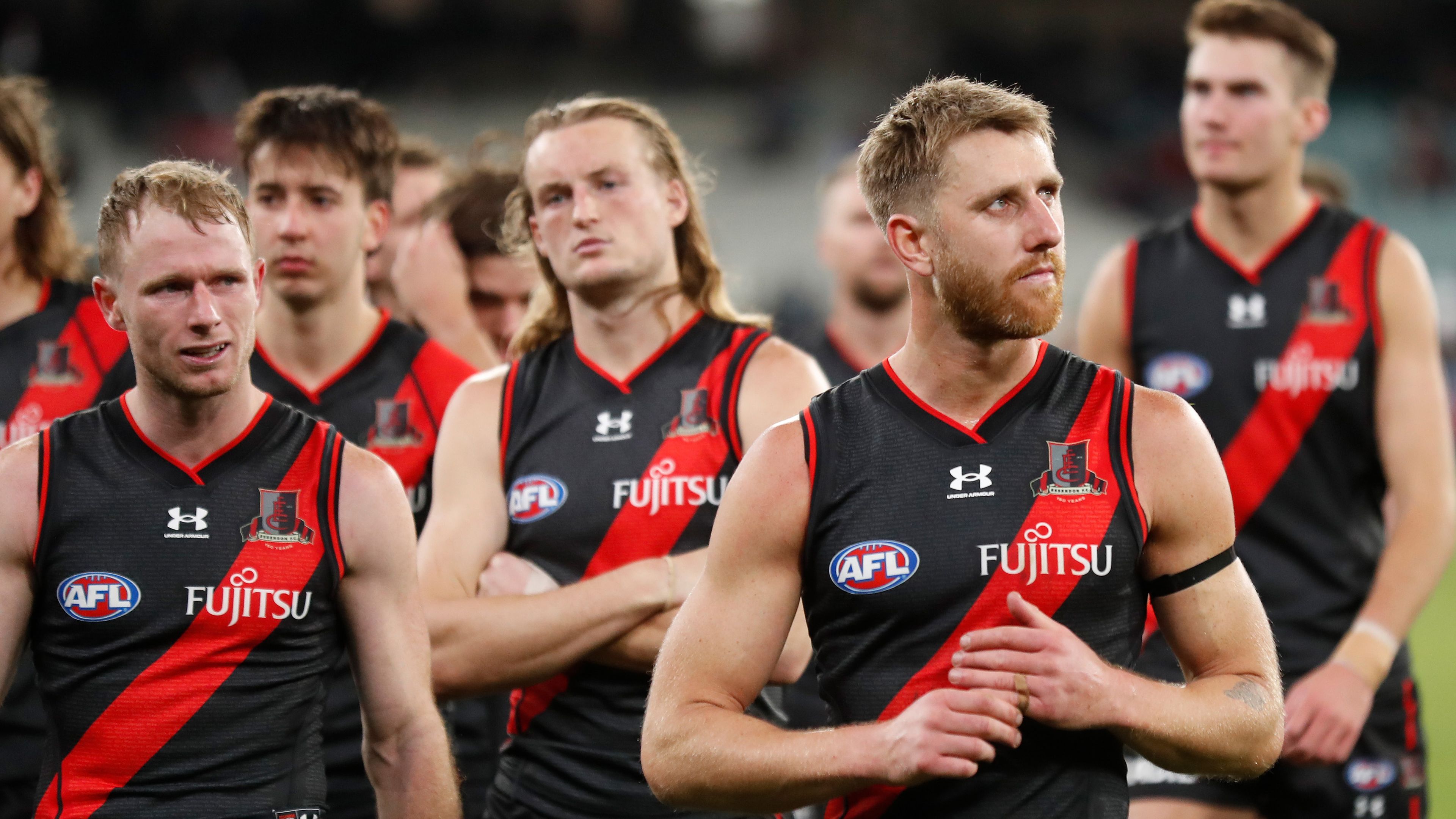 Dyson Heppell of the Bombers looks dejected after a loss during the 2022 AFL Round 13 match between the Essendon Bombers and the Carlton Blues at the Melbourne Cricket Ground on June 10, 2022 in Melbourne, Australia. (Photo by Michael Willson/AFL Photos via Getty Images)