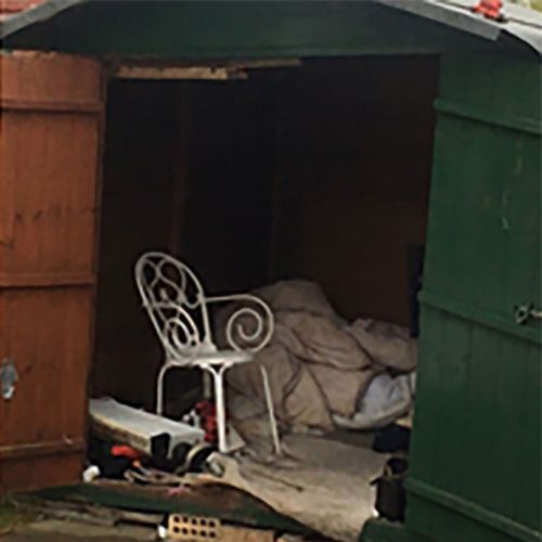 A photograph provided by the GLAA whihc rescued the man from the shed showed a small green garden shed with little inside but a duvet, a television, an electric heater and a scrap of carpet.