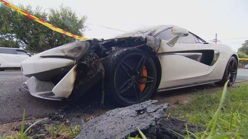 A luxury car worth nearly $400,000 was destroyed when a fire engine targeted a McLaren parked in the street late last night.