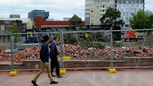 The wall collapsed on Swanston Street in Melbourne. (AAP)