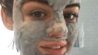 Actress Lucy Hale tests out a bubble mask.