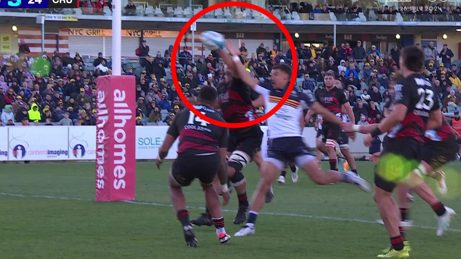 Crusaders player Quinten Strange purposely knocks the ball into touch, copping a yellow card and causing the visitors to concede a penalty try.