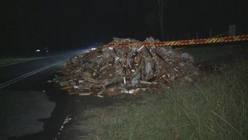 Giant pile of rubbish contaminated with asbestos found on fire in Sydney&#x27;s south west