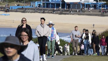 Locals enjoy the fine weather at Maroubra in Sydney, ahead of rain and wind.