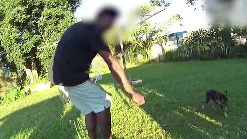 Police footage also shows the puppy attempting to avoid the owner when police attended the property. 