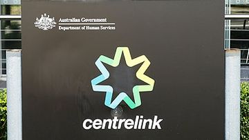 Centrelink sign and office (Getty)
