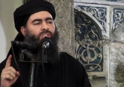 This image was released by Islamic State in 2014, purporting to show the leader of the Islamic State group, Abu Bakr al-Baghdadi, delivering a sermon at a mosque in Iraq during his first public appearance.