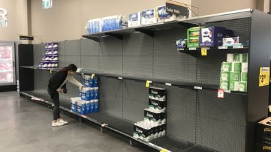 Supermarket shelves in Alexandria stripped of toilet paper.